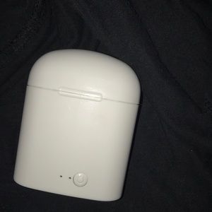 Bluetooth wireless headphones w/ charging case.